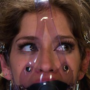 Felony Bound in Cruel Latex, Metal and Leather Bondage!